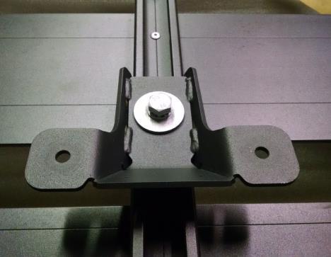 Insert the crossbars into the platform side bars and rotate into position as shown note correct slots as marked below. 4. Place a channel nut in the crossbar as shown below and rotate 90 degrees.