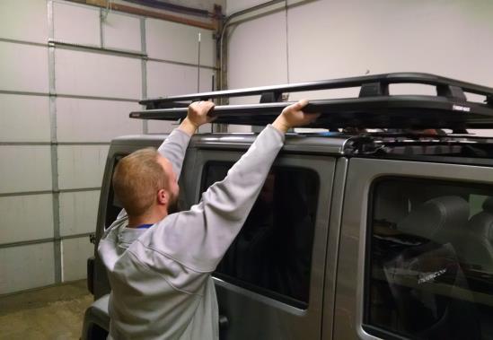 5. With help from a second person, lift the Platform over the Jeep and carefully place on the