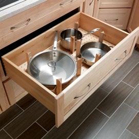 Roll-out trays keep cabinetry organized and maximize storage space.