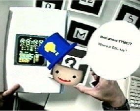 The Tiles interface supported collaboration on a number of different levels. Users could both be wearing HMDs and could see the shared virtual content.