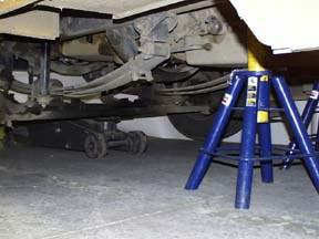 Step 2 Place suitable jack stands approximately 18 behind end of the leaf