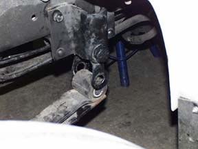 Typically the rear leaf spring frame hangers are bolted or riveted to the frame.