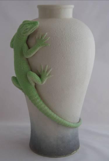 on ebay, a vase in GLACIELLE ware. Unusual in both finish and subject matter, with a green Lizard wrapped around the vase.