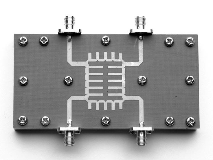 2122 IEEE TRANSACTIONS ON MICROWAVE THEORY AND TECHNIQUES, VOL. 51, NO. 10, OCTOBER 2003 Fig. 4. Photograph of fabricated 1.8-GHz compact branch-line hybrid. Fig. 6.