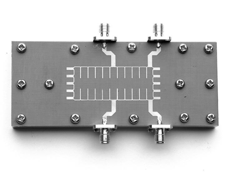 8-GHz compact rat-race hybrid. to reduce the widths of the inward pointing stubs, when the distance between the ends of these stubs ( in Fig.