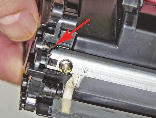 Turn the roller until the keyed end fits into the keyed slot in the end