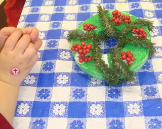 We let the kids squeeze on their own glue and stick on the clusters of berries.