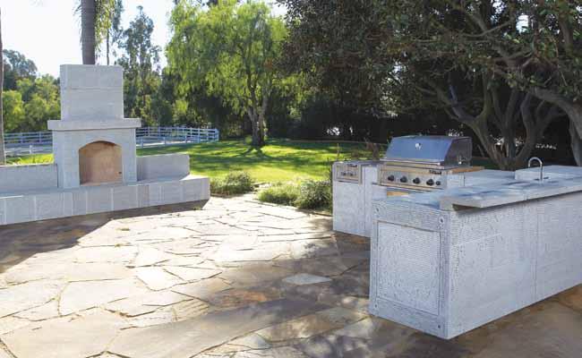 into custom barbecue islands, seating walls, columns, fireplaces