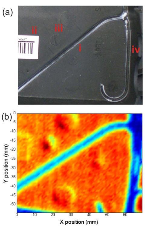 Terahertz Imaging: NDT (i) intended break line (ii) identification label (iii) stampings within the polymer (iv) retainer bars.
