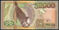 WORLD AND BRITISH BANKNOTES 795 Centrale Bank van Suriname, 100 gulden, 2 January 1957, serial number Z 01234567890, purple and green, woman s head, fruits and vegetables, torch with 1957 banner at