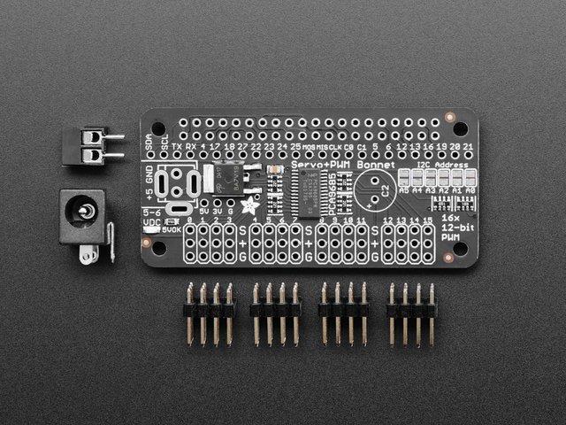The Adafruit 16-Channel 12-bit PWM/Servo HAT or Bonnet will drive up to 16 servos or PWM outputs over I2C with only 2 pins.