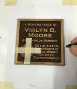 Turn the plaque over & place on the paper template (centered). Using a pen or pencil, trace the outline of the plaque.
