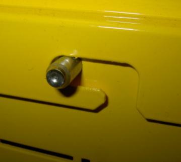 Three steps are required to access the governor: 1- Unscrew both panel fasteners.