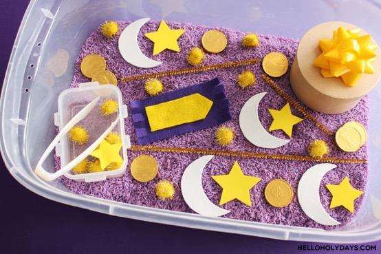 Ramadan Sensory Ideas Sensory boxes are meant to help kids learn to count, identify their colours and shapes, practice fine mo Count the white crescent moons.