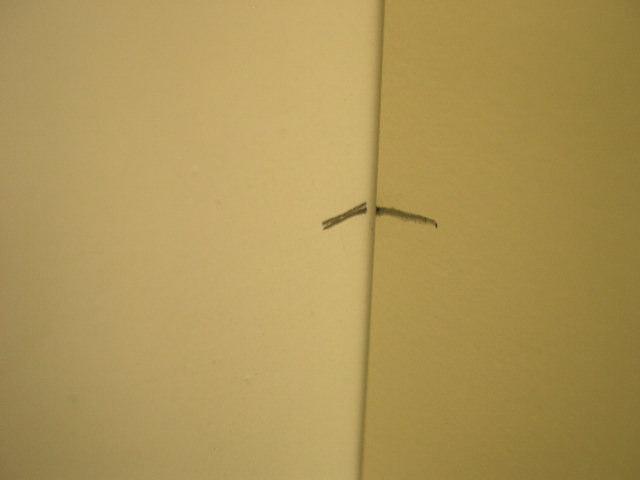 Roller Ball Catch USING A PENCIL, MAKE A SMALL MARK HORIZONTALLY ON THE WALL/DOOR AND A SMALL MARK ON THE FRAME.