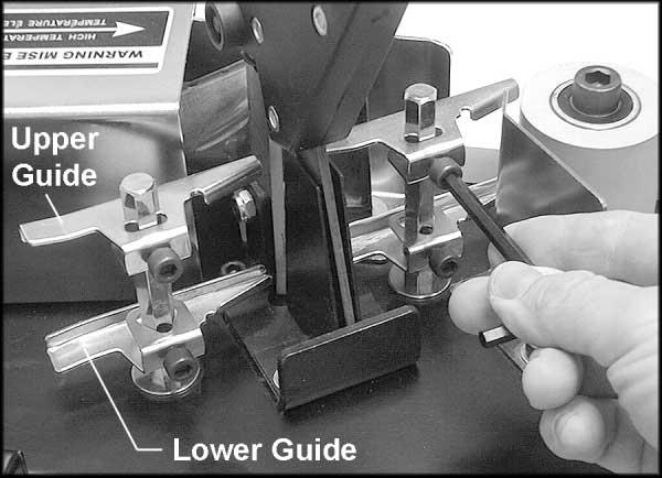 Adjustments Upper and Lower Guides The upper and lower guides can be adjusted by loosening the socket head cap screws with a 5mm hex wrench (provided). See Figure 4.