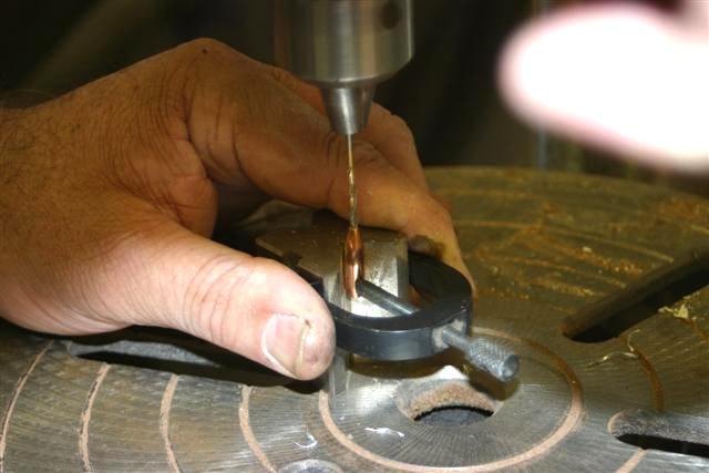 Drilling through the lead from the small end using the hollow