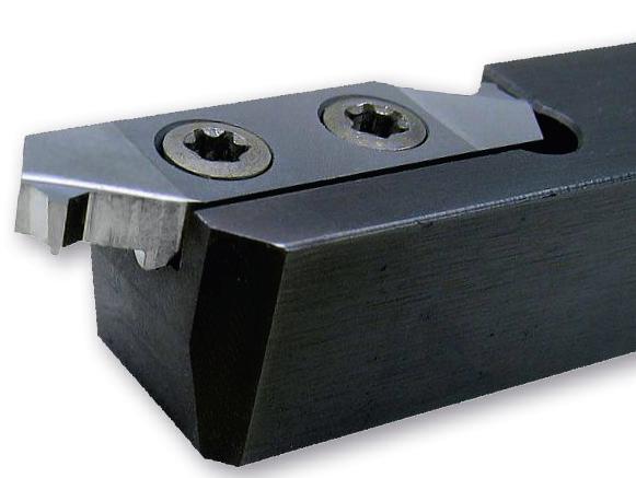 SPECIAL Turning tools with profiled inserts Turning tool with reversible solid tungsten carbide insert Change of insert without adjustment High precision of the insert's position Reduction of the