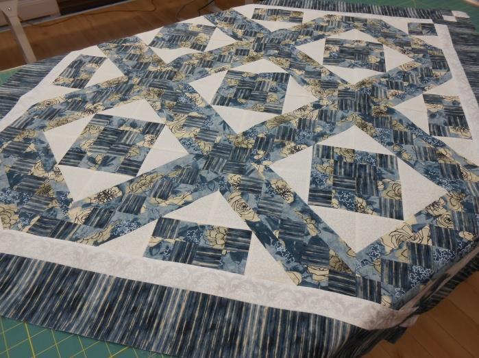 How to cut and piece each quilt block and how to get a perfect 1/4" seam every time. You will also learn how to assemble a quilt sandwich.