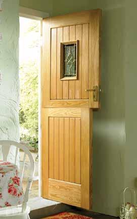 Chancery Oak Stable Glazed A boarded door with raised mouldings designed for maximum stability, with a small triple glazed water glass design surrounded with brass leading.