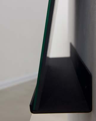 The mirror comes together with a powder coated industrial shelf.