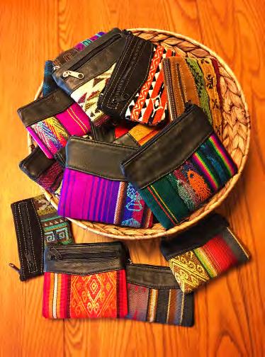 COIN PURSES OF FABRIC AND LEATHER These attractive coin purses (called monederos in Spanish) are fashioned from genuine leather and colorful woven fabrics. Each is unique.