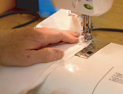 3. Trim any excess fusible stabilizer or quilt batting from edges.