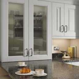 kitchen with raised panels and solid painted timber doors.