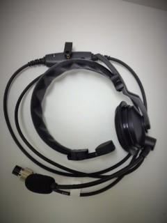 It is a comfortable over-the-top headset that is single earmuff and boom microphone.