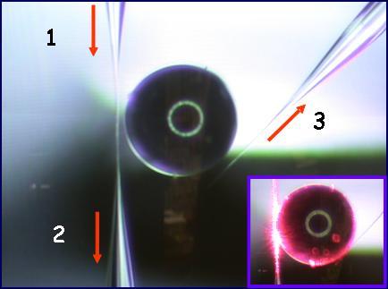 use either a prism or angle polished fibers. In the case of angle polished fiber, the coupling to high index materials is not possible, and the technique is limited to silica spheres or CaF 2 disks.