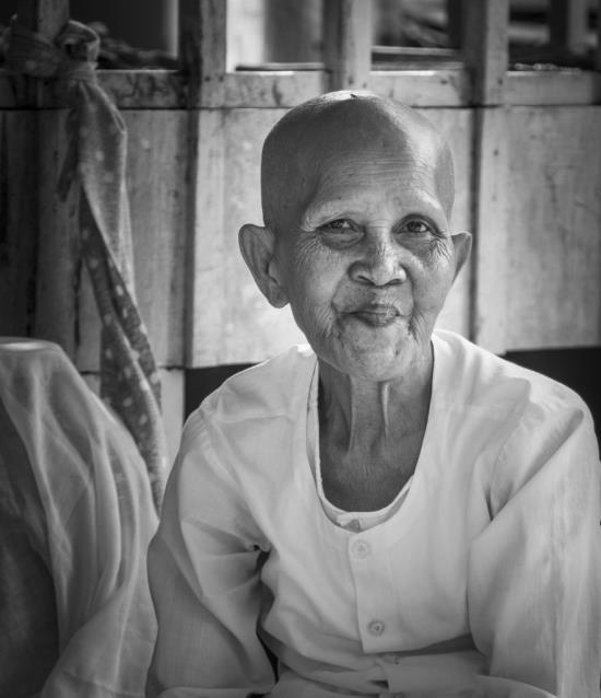 1st place Special-human portraits, Happy with life, by Paul Bruce The B&W image - We were visiting a monastery in Cambodia and we were able to