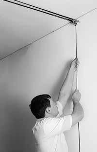 LOWER OBJECT Securely grip rope, apply tension, and angle it away from front. Bring arm up to let rope out and then back toward the to lock the rope. Repeat until object is at desired height.