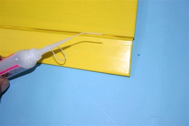Now apply epoxy in the wing joiner slot in the wing root and also apply epoxy on the