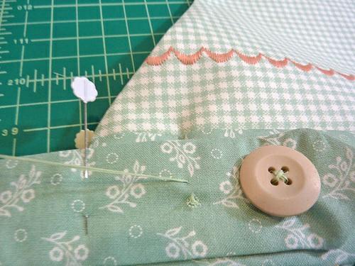 Hide the knot of the thread under the button by taking a stitch in place prior to laying down the button. 15.