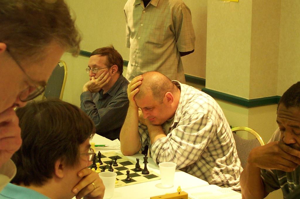 8 Virginia Chess Newsletter Fed and Wojo drew in blazing style while FM Rubenchik was holding Benjamin to a half point, which created a four-way tie after FM John Meyer joined the winners circle with