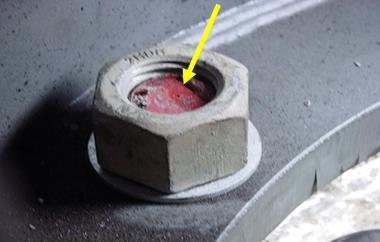 Aluminum light poles and signal pedestal use a single-nut connection may be used to attach the pole to the foundation.