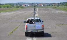 Measurement campaign on former airport: impact of ground reflections,