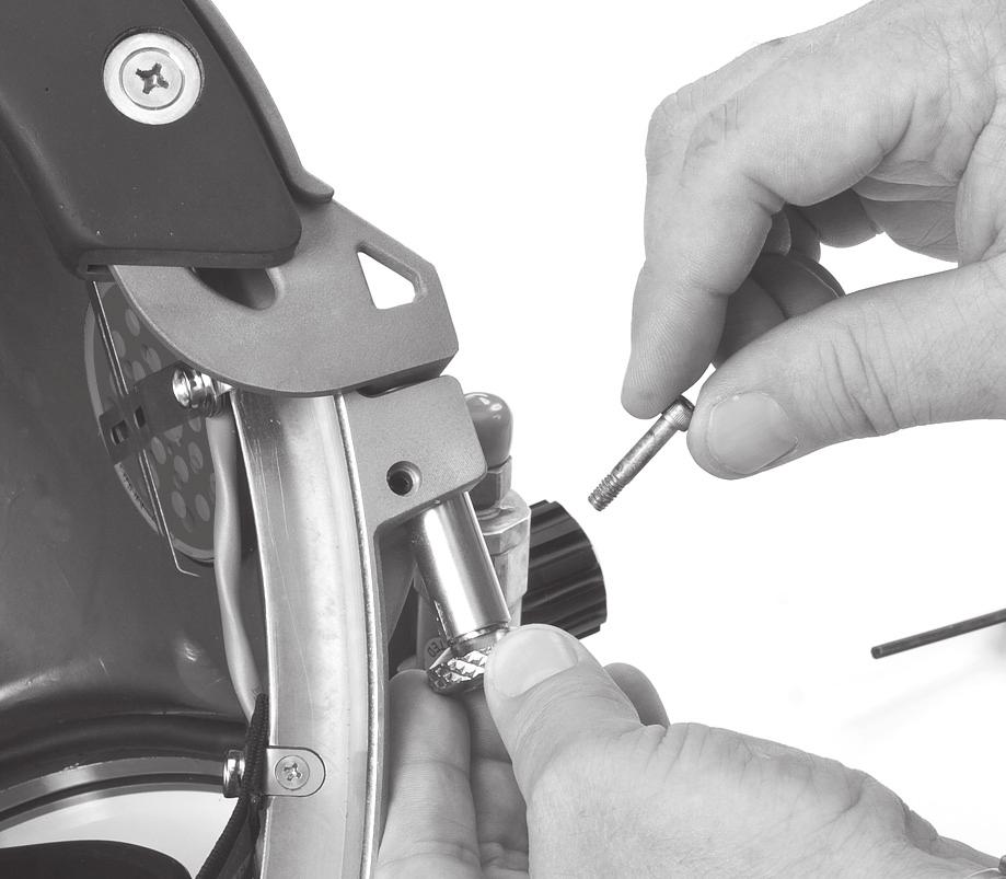 2) Remove the sealed pull pins by pulling them out of the helmet ring.