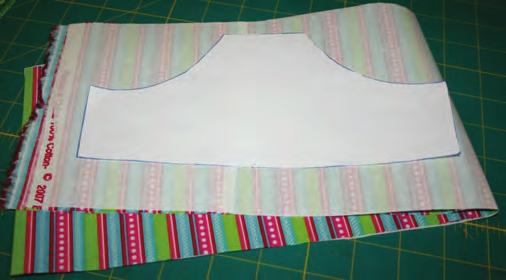 fabric for handle Cut two 10 x 20 1/2 lining fabric Cut two 9 x 20 Pellon Fusible Fleece Cut out panty applique template.