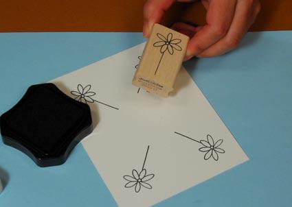 Stamp the Cute Daisy image three times with Black Marvy Matchable Inkpad