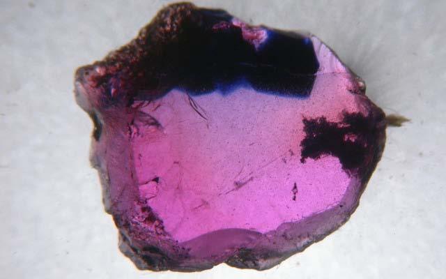 Figure DD-2. Blue/pink color zoning. Photomicrograph V.