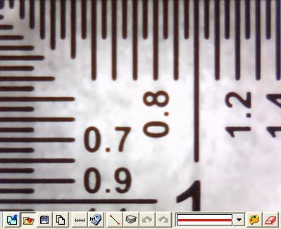 Use the calibrator as a measurement base, flatly put the machine on the observing object, adjust the focus to find the clearest image. See Fig.5-43 and Fig.5-44 the result from measurement.