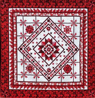 Clubs 2. New! Mystical Journey: This red and white quilt was designed by Canadian designer Lidia Froehler of A Cotton Treasures Designs.