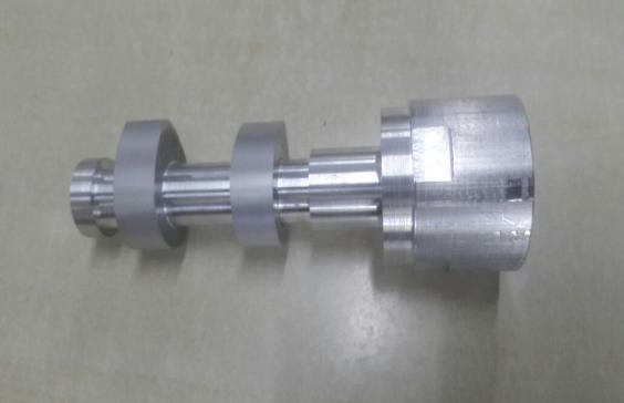 The finished camshaft is as shown in Fig. 26. Fig. 25 Semi finishing completed Fig. 26 Completed camshaft III.