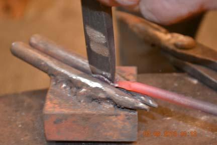 Using a "two-finger swage" and a chisel or thin fuller,