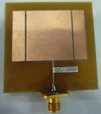 Figure.7 Measured peak antenna gain for the dual band planar RMSA at 2.4GHz and 2.8GHz. Figure.8 Photo of fabricated planar RMSA IV.