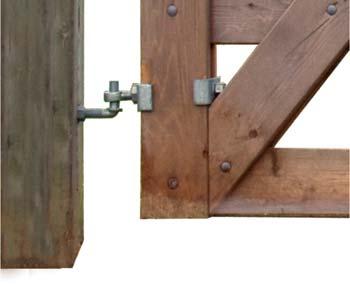 Install the Adjustable Bottom Fitting On the hinge stile of the gate between the bottom rail and the one above it keeping it as low as possible but not interfering with the diagonal support.
