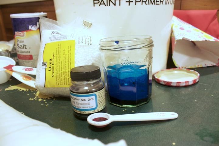 Step 7: Put on your rubber gloves. Mix the powdered dye with a small amount of warm water (approx. ½ cup).