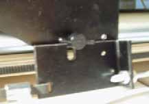 On the motor box there is a locking lever. To disengage the lever press to the right, unlock the latch and slide the lever to the left. 2.