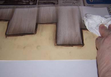 Apply only brown pastel onto the same edge used previously.